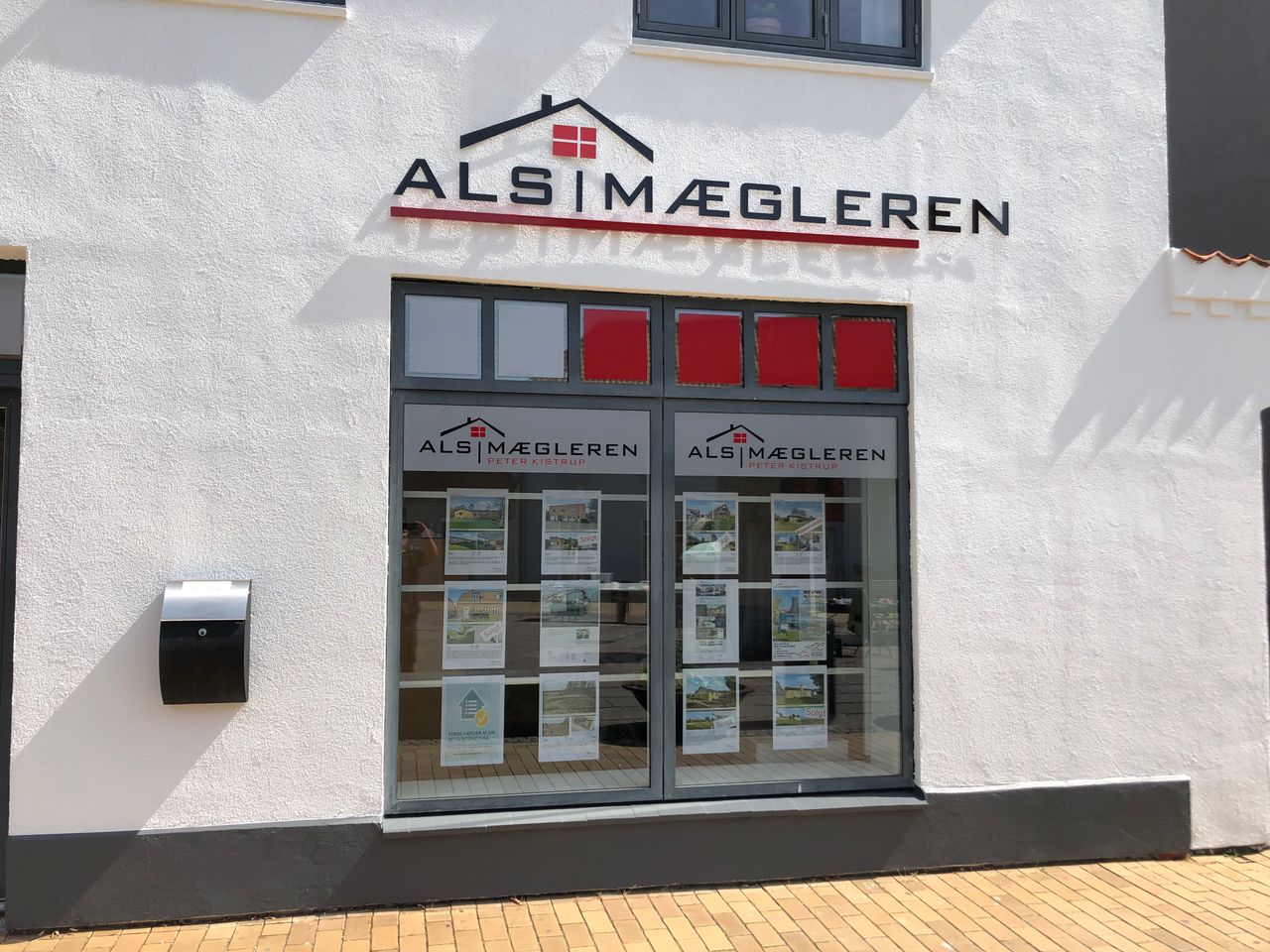Als Mægleren logo